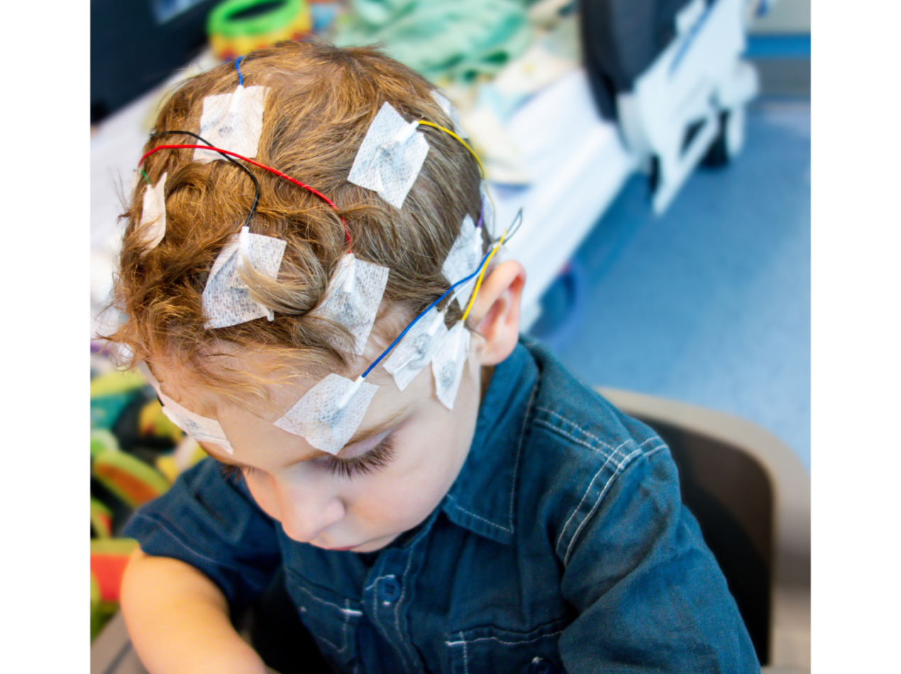 Child with Epilepsy readers on their head