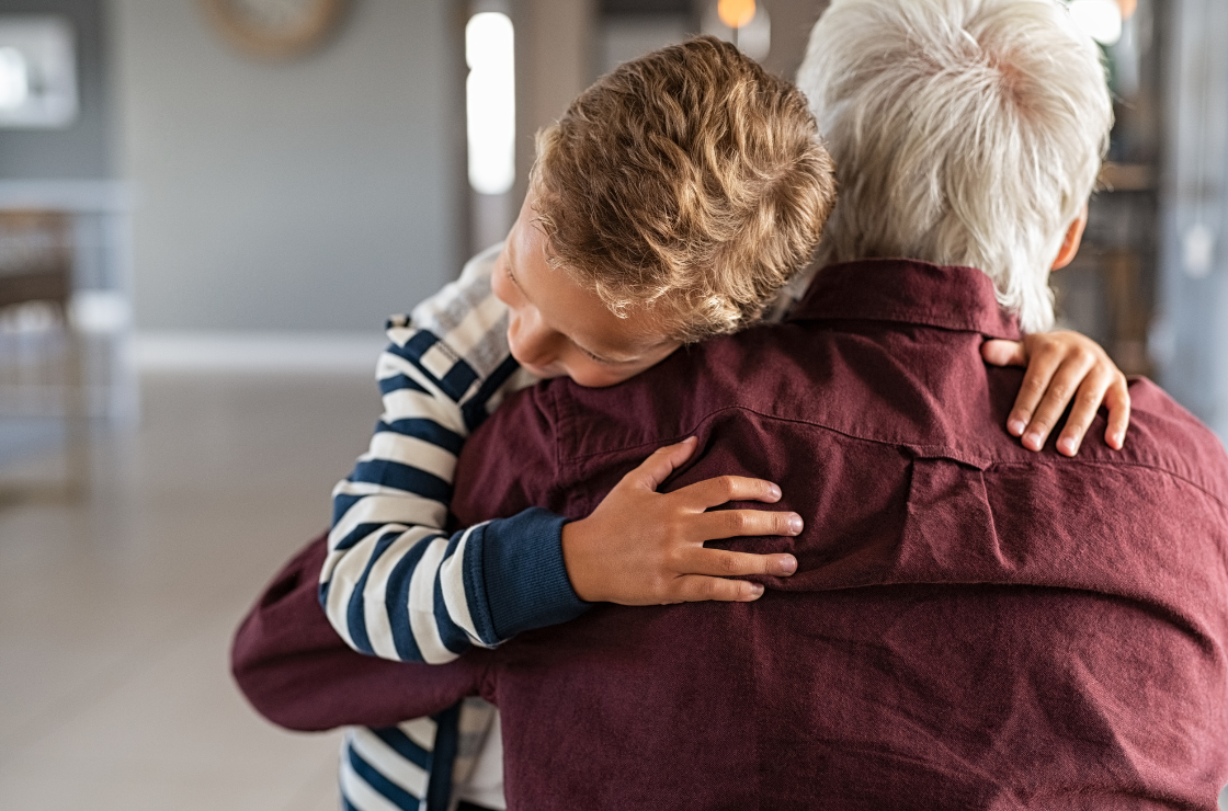 Caregiver holding young child